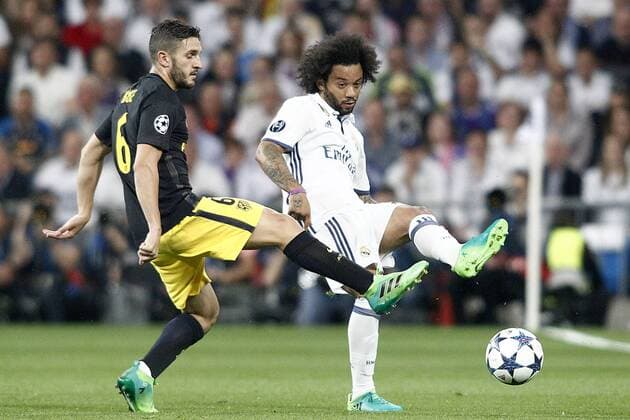 Real Madrid s Marcelo Vieira (r) and Atletico de Madrid s Koke Resurrecccion during Champions League 2016 2017 Semi-finals 1st leg match. May 2,2017.  (20170502173)