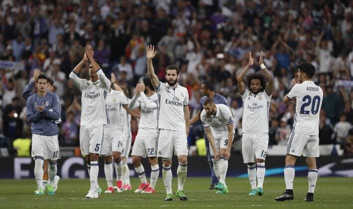 Partido de ida de semifinales de la Liga de Campeones entre el Real Madrid y el Atletico en el Bernabeu. En la imagen, los jugadores del Real Madrid celebran la victoria. First leg of Champions League semifinals between Real Madrid and Atletico. In this picture, Real Madrid players celebrate the victory. xPabloxGarciax 
