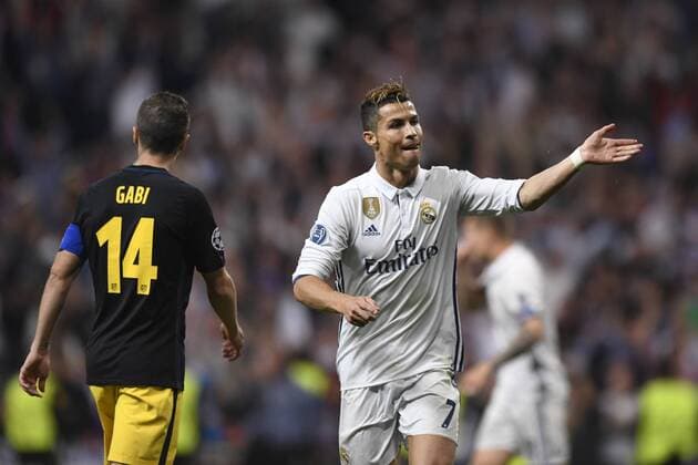 Partido de ida de semifinales de la Liga de Campeones entre el Real Madrid y el Atletico en el Bernabeu. En la imagen, Cristiano Ronaldo celebra su tercer gol. First leg of Champions League semifinals between Real Madrid and Atletico. In this picture, Cristiano Ronaldo celebrates his third goal. xJUANxAGUADOx 