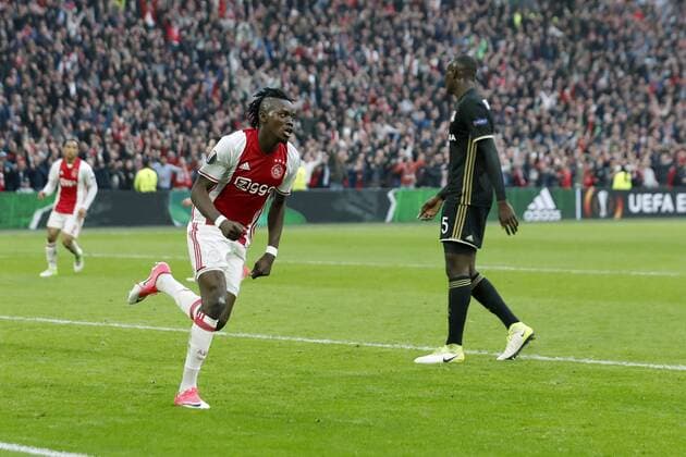 (L-R) Kenny Tete of Ajax, Bertrand Traore of Ajax, Nicolas Nkoulou of Olympique Lyonnaisduring the UEFA Europa League semi final match between Ajax Amsterdam and Olympique Lyonnais at the Amsterdam Arena on May 03, 2017 in Amsterdam, The Netherlands Ajax v Olympique Lyon UEFA Europa League 2016 2017 xVIxxIVx 7717633