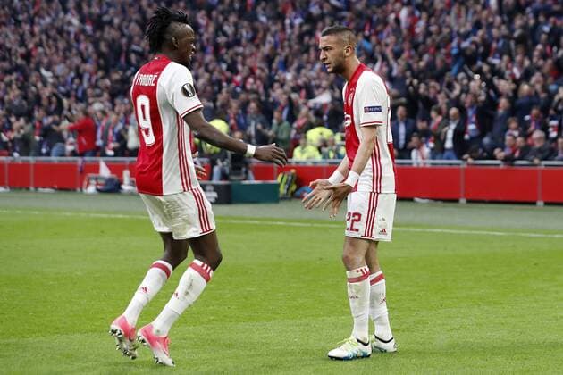 (L-R) Bertrand Traore of Ajax, Hakim Ziyech of Ajaxduring the UEFA Europa League semi final match between Ajax Amsterdam and Olympique Lyonnais at the Amsterdam Arena on May 03, 2017 in Amsterdam, The Netherlands Ajax v Olympique Lyon UEFA Europa League 2016 2017 xVIxxIVx 7717634
