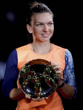 Romanian tennis player Simona Haelpp poses with the trophy of the Mutua Charity Tie Break Tens against gender violence at the Magic Box in Madrid, Spain, 04 May 2017. MUTUA CHARITY TIE BREAK TENS !ACHTUNG: NUR REDAKTIONELLE NUTZUNG!  Copyright: xJuanJoxMartínx MAD001 20170505-636295394887857997