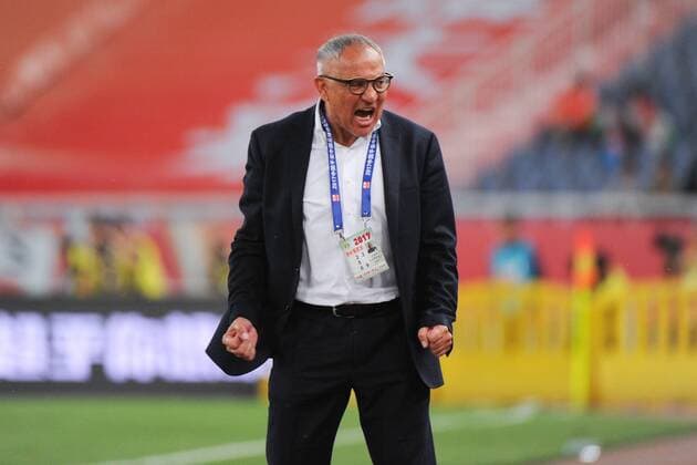 Head coach Felix Magath of Shandong Luneng reacts as he watches his players competing against Guangzhou R&F in their 8th round match during the 2017 Chinese Football Association Super League (CSL) in Ji nan city, east China s Shandong province, 7 May 2017. Shandong Luneng defeated Guangzhou R&F 3-0. Shandong Luneng defeats Guangzhou R&F at 8th round of 2017 CSL  20170507_83411