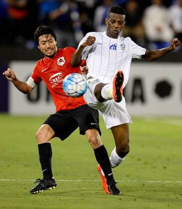 (170509) -- DOHA, May 9, 2017 -- Faisal Darwish Faraj (R) of Al-Hilal vies with Rodrigo Tabata of AL Rayyan during the AFC Asian Champions League Group D match between Qatar s AL Rayyan and Saudi Arabia s Al Hilal at Jassim Bin Hamad Stadium in Doha, capital of Qatar, May 8, 2017. Al-Hilal won 4-3. ) (SP)QATAR-DOHA-SOCCER-AFC-CHAMPIONS LEAGUE-MD6-GOURP D Nikku 