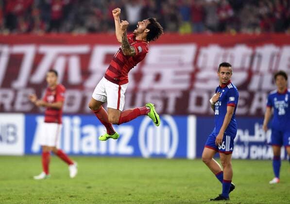 Brazilian football player Ricardo Goulart of China s Guangzhou Evergrande F.C., center, celebrates after scoring a goal against South Korea s Suwon Samsung Bluewings in a Group G during the 2017 AFC Champions League in Guangzhou city, south China s Guangdong province, 9 May 2017. Local Caption Guangzhou Evergrande competes against Suwon Samsung Bluewings at 2017 AFC Champions League  20170509_08130