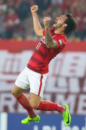 Brazilian football player Ricardo Goulart of China s Guangzhou Evergrande F.C., left, celebrates after scoring a goal against South Korea s Suwon Samsung Bluewings in a Group G during the 2017 AFC Champions League in Guangzhou city, south China s Guangdong province, 9 May 2017. Local Caption Guangzhou Evergrande competes against Suwon Samsung Bluewings at 2017 AFC Champions League  20170509_31185