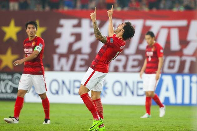 Brazilian football player Ricardo Goulart of China s Guangzhou Evergrande F.C., left, celebrates after scoring a goal against South Korea s Suwon Samsung Bluewings in a Group G during the 2017 AFC Champions League in Guangzhou city, south China s Guangdong province, 9 May 2017. Local Caption Guangzhou Evergrande competes against Suwon Samsung Bluewings at 2017 AFC Champions League  20170509_31184