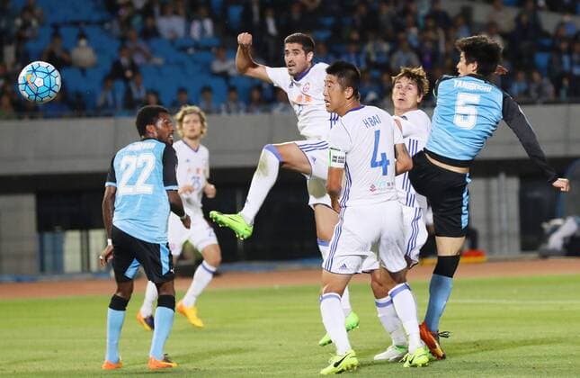 Kawasaki Frontale vs Eastern SC in Asian Champions League Midfielder Shogo Taniguchi (R) of Japan s Kawasaki Frontale heads a goal during the first half of an Asian Champions League Group G match against Hong Kong s Eastern SC in Kawasaki, south of Tokyo, on May 9, 2017. 