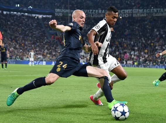 (170510) -- TURIN, May 10, 2017 -- Alex Sandro(R) of Juventus vies with Andrea Raggi of Monaco during the UEFA Champions League semifinal second leg match between Juventus and Monaco in Turin, Italy, on May 9, 2017. Juventus won 2-1 and advanced to the final with 4-1 on aggregate. )(wll) (SP)ITALY-TURIN-SOCCER-UCL-JUVENTUS VS MONACO AlbertoxLingria 
