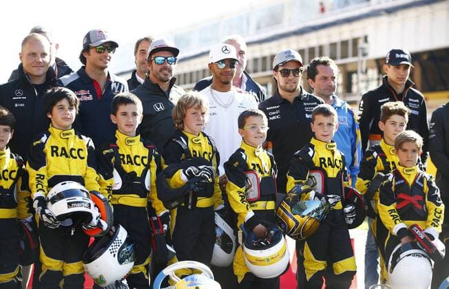 Motorsports: FIA Formula One World Championship WM Weltmeisterschaft 2017, Grand Prix of Spain, 77 Valtteri Bottas (FIN, Mercedes AMG Petronas F1 Team), 55 Carlos Sainz Junior (ESP, Scuderia Toro Rosso), 14 Fernando Alonso (ESP, McLaren Honda), 44 Lewis Hamilton (GBR, Mercedes AMG Petronas F1 Team), 11 Sergio Perez (MEX, Sahara Force India F1 Team), 31 Esteban Ocon (FRA, Sahara Force India F1 Team) with young cart drivers Barcelona Spain xHOCHxZWEIx