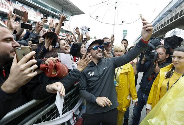 Spanish pilot Fernando Alonso of McLaren-Honda takes a selfie with fans at the Barcelona-Catalonia racetrack where the Spanish Formula One Grand Prix starts tomorrow, in Montmelo, Catalonia, Spain, 11 May 2017. PREPARATIONS FOR THE SPANISH F1 GP !ACHTUNG: NUR REDAKTIONELLE NUTZUNG!  Copyright: xAndreuxDalmaux MTM001 20170511-636301302061342446