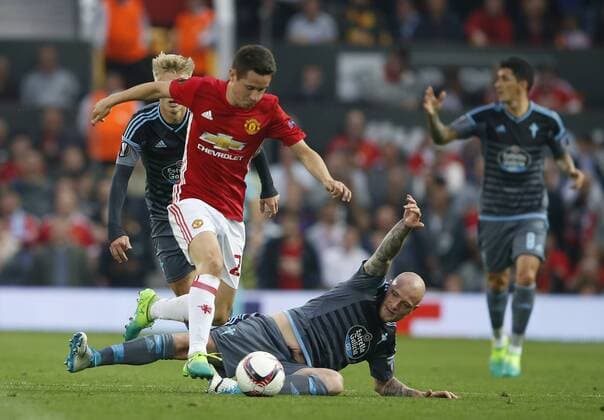 Ander Herrera of Manchester United ManU in action with John Guidetti of Celta Vigo during the Europa League Semi Final 2nd Leg match at Old Trafford Stadium, Manchester. Picture date: May 11th 2017. Pic credit should read: Simon Bellis Sportimage EDITORIAL USE ONLY. No use with unauthorised audio, video, data, fixture lists, club league logos or live services. Online in-match use limited to 120 images, no video emulation. No use in betting, games or single club league player publications.