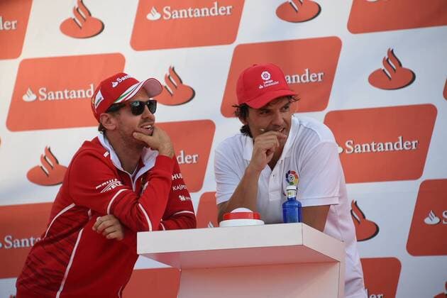 Formel 1, GP Spanien, Ferrari Promo-Event Ambiente antes del GP de F1 de Espana en el circuito de Montmeló. En la imagen, Sebastian Vettel y Fernando Morientes. Atmosphere before Spain F1 GP at Montmeló circuit. In this picture, Sebastian Vettel and Fernando Morientes. xRVxRacingxPressx  RV RACING PRESS