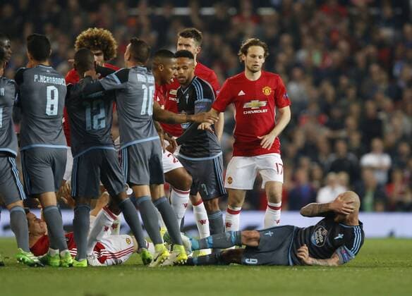Themen der Woche - SPORT Bilder des Tages - SPORT Fußball, EL, Manchester United - Celta de Vigo John Guidetti of Celta Vigo goes down following a mass brawl during the Europa League Semi Final 2nd Leg match at Old Trafford Stadium, Manchester. Picture date: May 11th 2017. Pic credit should read: Simon Bellis Sportimage EDITORIAL USE ONLY. No use with unauthorised audio, video, data, fixture lists, club league logos or live services. Online in-match use limited to 120 images, no video emulation. No use in betting, games or single club league player publications.