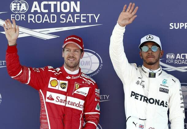 British Formula One driver Lewis Hamilton (R) from Mercedes AMG and German Sebastian Vettel (L) celebrate their pole position and second best time, respectively, after the qualifying session held at the Circuit de Barcelona-Catalunya in Montmelo, near Barcelona, northeastern Spain, 13 May 2017. The 2017 Formula One Grand Prix of Spain will take place on 14 May 2017. Formula One Grand Prix of Spain !ACHTUNG: NUR REDAKTIONELLE NUTZUNG!  Copyright: xANDREUxDALMAUx 20170513-636302897080073289