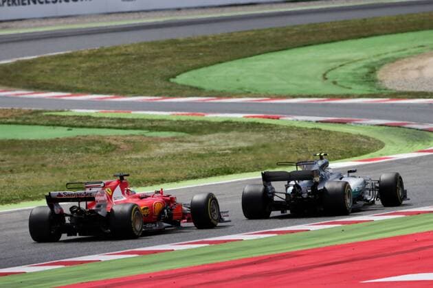 Spanish Grand Prix, Barcelona 11 - 14 May 2017 Valtteri Bottas (FIN) Mercedes AMG F1 W08 and Sebastian Vettel (GER) Ferrari SF70H battle for position. 14.05.2017. 