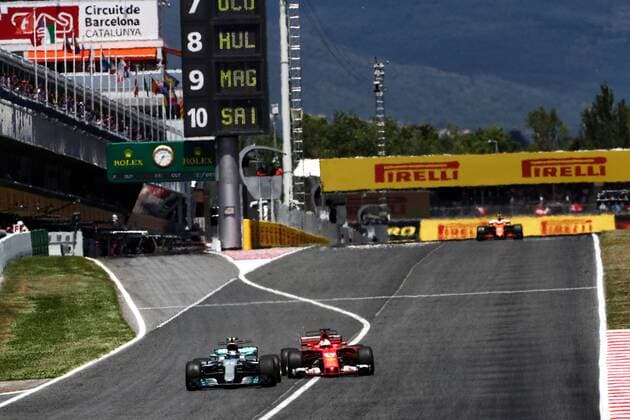 Spanish Grand Prix, Barcelona 11 - 14 May 2017 Valtteri Bottas (FIN) Mercedes AMG F1 W08 and Sebastian Vettel (GER) Ferrari SF70H battle for position. 14.05.2017. 