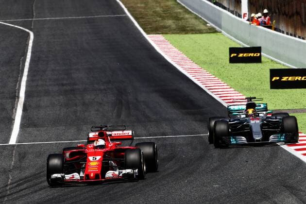Spanish Grand Prix, Barcelona 11 - 14 May 2017 Sebastian Vettel (GER) Ferrari SF70H and Lewis Hamilton (GBR) Mercedes AMG F1 W08 battle for the lead of the race. 14.05.2017. 