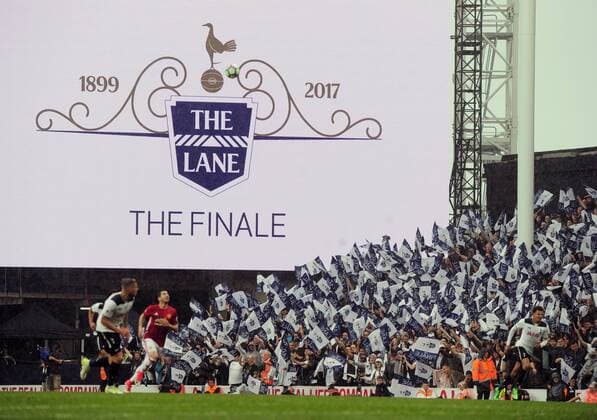Football - 2016 2017 Premier League - Tottenham Hotspur vs. Manchester United ManU Tottenham fans wave their flags during the game at White Hart Lane. COLORSPORT ANDREW COWIE 
