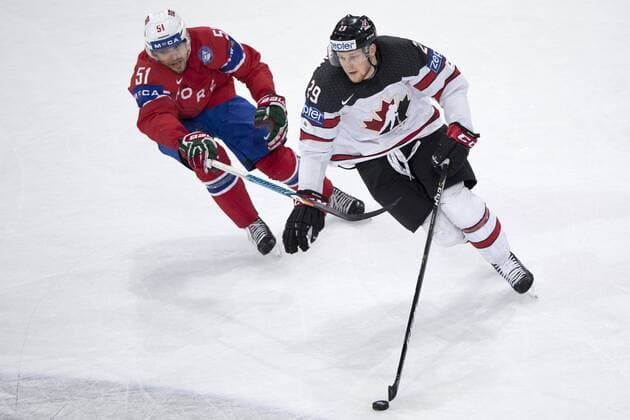 From left: Mats Rosseli Olsen of Norway and Nate MacKinnon of Canada in action during the Ice hockey Eishockey World Championships group B match between Canada and Norway in the AccorHotels Arena in Paris, France, Monday, May 15, 2017. (CTKxPhoto MichalxKamaryt) CTKPhotoP201705150788301  kmt 5