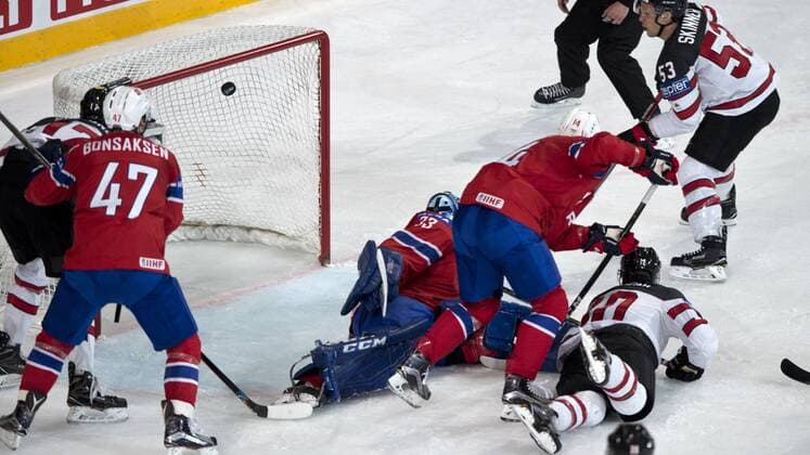 From left: Alexander Bonsaksen of Norway, goalkeeper of Norway Henrik Haukeland, Dennis Sveum of Norway and Jeff Skinner of Canada in action during the Ice hockey Eishockey World Championships group B match between Canada and Norway in the AccorHotels Arena in Paris, France, Monday, May 15, 2017. (CTKxPhoto MichalxKamaryt) CTKPhotoP201705150781801  kmt 3