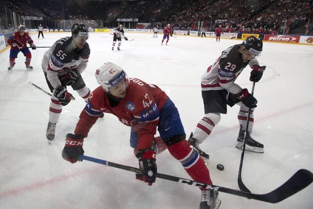 From leftMark Scheifele of Canada, Henrik Odegaard of Norway and Nathan MacKinnon of Canada in action during the Ice hockey Eishockey World Championships group B match between Canada and Norway in the AccorHotels Arena in Paris, France, Monday, May 15, 2017. (CTKxPhoto MichalxKamaryt) CTKPhotoP201705150890901  kmt 14