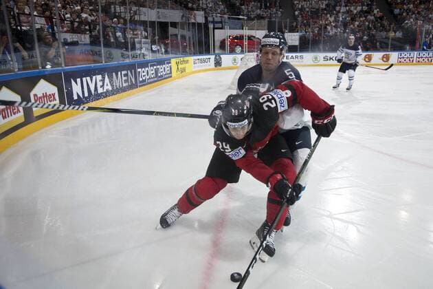 From front: Nathan MacKinnon of Canada and Lasse Kukkonen of Finland in action during the Ice hockey Eishockey World Championships group B match between Canada and Finland in Paris, France, Tuesday, May 16, 2017. (CTKxPhoto MichalxKamaryt) CTKPhotoP201705161047601  kmt 8