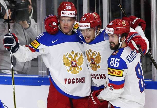 COLOGNE, GERMANY - MAY 20, 2017: Russia s Yevgeny Kuznetsov, Artemy Panarin, and Nikita Kucherov (L-R) celebrate a goal against Canada in their 2017 IIHF Ice hockey Eishockey World Championship WM Weltmeisterschaft semifinal match at Lanxess Arena. Anton Novoderezhkin TASS  TS04F6F5