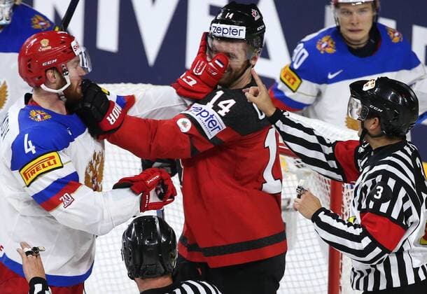 COLOGNE, GERMANY - MAY 20, 2017: Russia s Vladislav Gavrikov (L) and Canada s Sean Couturier (C) in their 2017 IIHF Ice hockey Eishockey World Championship WM Weltmeisterschaft semifinal match at Lanxess Arena. Anton Novoderezhkin TASS  TS04F704