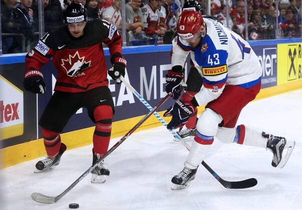 COLOGNE, GERMANY - MAY 20, 2017: Canada s Travis Konecny (L) and Russia s Valery Nichushkin in their 2017 IIHF Ice hockey Eishockey World Championship WM Weltmeisterschaft semifinal match at Lanxess Arena. Alexander Demianchuk TASS  TS04F710