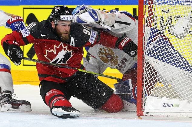 COLOGNE, GERMANY - MAY 20, 2017: Canada s Ryan O Reilly (L) and Russia s goaltender Andrei Vasilevsky (R) in their 2017 IIHF Ice hockey Eishockey World Championship WM Weltmeisterschaft semifinal match at Lanxess Arena. Alexander Demianchuk TASS  TS04F715