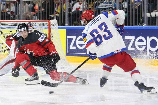 COLOGNE, GERMANY - MAY 20, 2017: Canada s Josh Morrissey (L) and Russia s Yevgeny Dadonov in their 2017 IIHF Ice hockey Eishockey World Championship WM Weltmeisterschaft semifinal match at Lanxess Arena. Alexander Demianchuk TASS  TS04F706