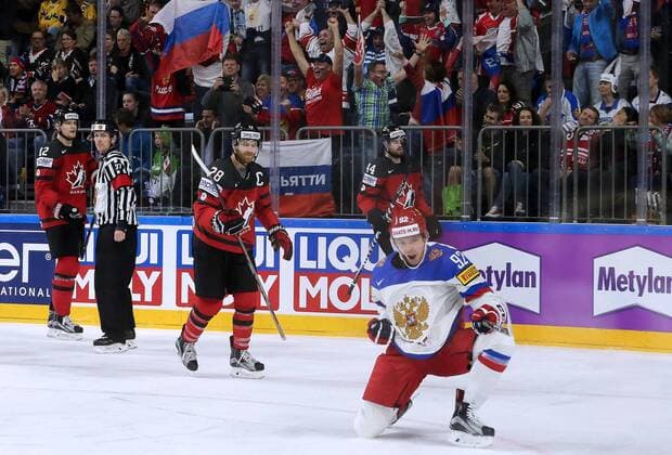 COLOGNE, GERMANY - MAY 20, 2017: Russia s Yevgeny Kuznetsov (front) celebrates a goal, as Canada s Colton Parayko, Claude Giroux, Marc Edouard Vlasic (L-R back) look on in their 2017 IIHF Ice hockey Eishockey World Championship WM Weltmeisterschaft semifinal match at Lanxess Arena. Alexander Demianchuk TASS  TS04F701