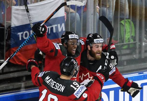 COLOGNE, GERMANY - MAY 20, 2017: Canada s Mike Matheson, Wayne Simmonds, Ryan O Reilly (L-R) celebrate a goal against Russia in their 2017 IIHF Ice hockey Eishockey World Championship WM Weltmeisterschaft semifinal match at Lanxess Arena; Canada won 4-2. Anton Novoderezhkin TASS  TS04F71F