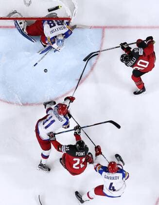 COLOGNE, GERMANY - MAY 20, 2017: Russia s goaltender Andrei Vasilevsky (top L), Sergei Andronov (bottom L), Vladislav Gavrikov (bottom R), and Canada s Brayden Point (bottom C) and Ryan O Reilly (R) in their 2017 IIHF Ice hockey Eishockey World Championship WM Weltmeisterschaft semifinal match at Lanxess Arena; Canada won 4-2. Anton Novoderezhkin TASS  TS04F768