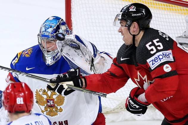 COLOGNE, GERMANY - MAY 20, 2017: Russia s goaltender Andrei Vasilevsky (L), and Canada s Mark Scheifele (R) in their 2017 IIHF Ice hockey Eishockey World Championship WM Weltmeisterschaft semifinal match at Lanxess Arena; Canada won 4-2. Anton Novoderezhkin TASS  TS04F714