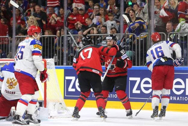COLOGNE, GERMANY - MAY 20, 2017: Canada s Wayne Simmonds (CL) and Ryan O Reilly (CR) celebrate a goal against Russia in their 2017 IIHF Ice hockey Eishockey World Championship WM Weltmeisterschaft semifinal match at Lanxess Arena; Canada won 4-2. Alexander Demianchuk TASS  TS04F73E