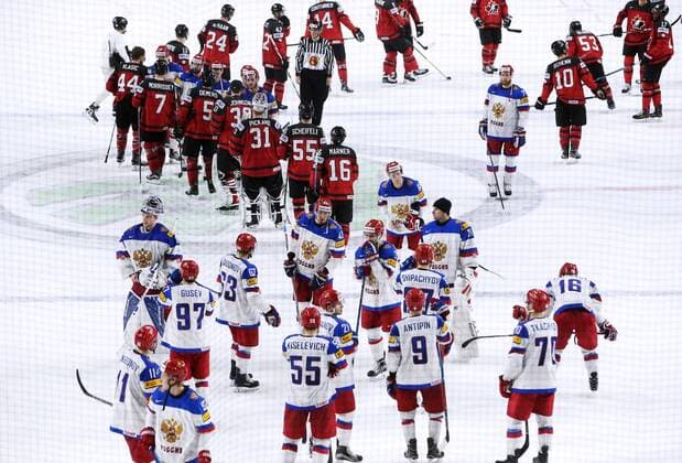 COLOGNE, GERMANY - MAY 20, 2017: Russian and Canadian players after their 2017 IIHF Ice hockey Eishockey World Championship WM Weltmeisterschaft semifinal match at Lanxess Arena; Canada won 4-2. Alexander Demianchuk TASS  TS04F72C