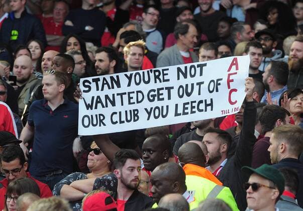 Football - 2016 2017 Premier League - Arsenal vs. Everton Banner telling Arsenal Share holder Stan Kroenke to leave the club at The Emirates. COLORSPORT ANDREW COWIE 