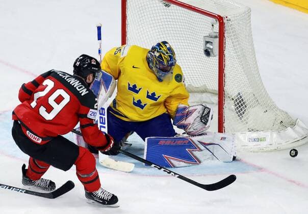 (170522) -- COLOGNE, May 22, 2017 -- Sweden s Henrik Lundqvist (R) saves during the 2017 IIHF Ice hockey Eishockey World Championship WM Weltmeisterschaft final against Canada in Cologne, Germany, on May 21, 2017. Sweden won 2-1 and claimed the title. ) (SP)GERMANY-COLOGNE-ICE HOCKEY-IIHF-WORLD CHAMPIONSHIP-FINAL LuoxHuanhuan 