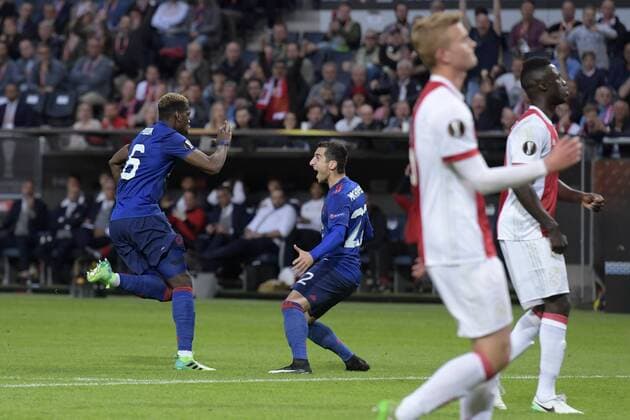 170524 Manchester Uniteds Paul Pogba gör 1-0-malet och jublar med Henrikh Mkhitaryan under finalen i Europa League mellan Ajax och Manchester United ManU den 24 maj 2017 i Stockholm.  Copyright: JOELxMARKLUND BB170524JM008