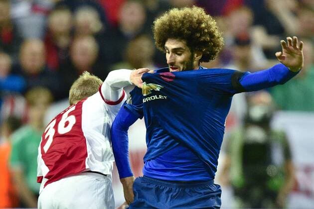 170524 Ajax Matthijs de Ligt och Manchester Uniteds Marouane Fellaini i närkamp under finalen i Europa League mellan Ajax och Manchester United ManU den 24 maj 2017 i Stockholm.  Copyright: LUDVIGxTHUNMAN BB170524LT037