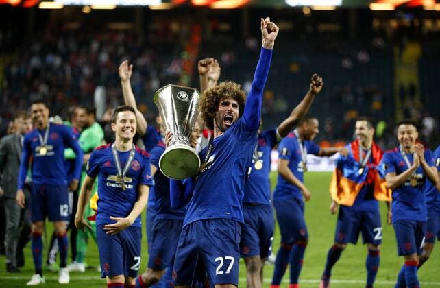 Marouane Fellaini of Manchester United ManU celebrates with the trophy after the UEFA Europa League Final match at the Friends Arena, Stockholm. Picture date: May 24th, 2017.Picture credit should read: Matt McNulty Sportimage EDITORIAL USE ONLY. No use with unauthorised audio, video, data, fixture lists, club league logos or live services. Online in-match use limited to 120 images, no video emulation. No use in betting, games or single club league player publications.