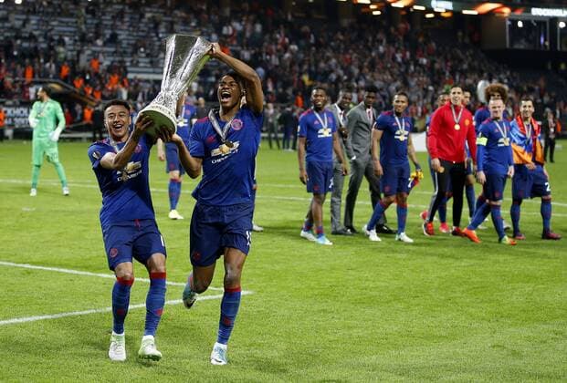 Jesse Lingard of Manchester United ManU and Marcus Rashford celebrate with the trophy after the UEFA Europa League Final match at the Friends Arena, Stockholm. Picture date: May 24th, 2017.Picture credit should read: Matt McNulty Sportimage EDITORIAL USE ONLY. No use with unauthorised audio, video, data, fixture lists, club league logos or live services. Online in-match use limited to 120 images, no video emulation. No use in betting, games or single club league player publications.