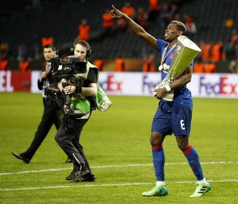 Paul Pogba of Manchester United ManU celebrates with the trophy after the UEFA Europa League Final match at the Friends Arena, Stockholm. Picture date: May 24th, 2017.Picture credit should read: Matt McNulty Sportimage EDITORIAL USE ONLY. No use with unauthorised audio, video, data, fixture lists, club league logos or live services. Online in-match use limited to 120 images, no video emulation. No use in betting, games or single club league player publications.