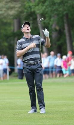 May 25th 2017, Virginia Water, Wentworth, Surrey, England; BMW PGA Golf Herren Championship golf, day 1; Justin Rose disappointed after hitting his approach to the 15th green xDavidxKissmanx  ActionPlus11883368