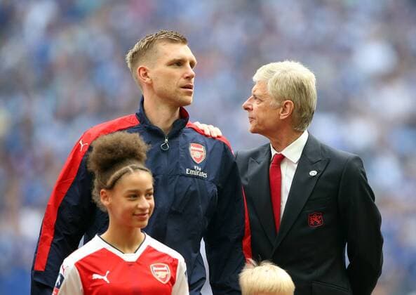 Per Mertesacker of Arsenal with Arsene Wenger manager of Arsenal during the Emirates FA Cup Final match at Wembley Stadium, London. Picture date: May 27th, 2017.Picture credit should read: David Klein Sportimage EDITORIAL USE ONLY. No use with unauthorised audio, video, data, fixture lists, club league logos or live services. Online in-match use limited to 120 images, no video emulation. No use in betting, games or single club league player publications.