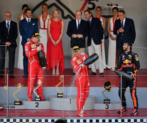 (170529) -- MONACO, May 29, 2017 -- Third placed Red Bull Racing driver Daniel Ricciardo(Front R) of Australia, champion Ferrari driver Sebastian Vettel (Front C) of Germany, second placed Ferrari driver Kimi Raikkonen (Front L) of Finland celebrate on the podium of the Formula One Monaco Grand Prix in Monaco, on May 28, 2017. ) (SP)MONACO-F1-GRAND PRIX MichaelxAlesi 