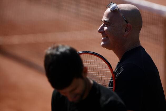 May 29, 2017 - Paris, France - Coach Andre Agassi smiles during a Novak Djokovic training session prior to his match against Marcel Granollers of Spain on day two of the 2017 French Open at Roland Garros on May 29, 2017 in Paris, France. 2017 French Open - Day Two  - ZUMAn230 20170529_zaa_n230_142 Copyright: xMehdixTaamallahx