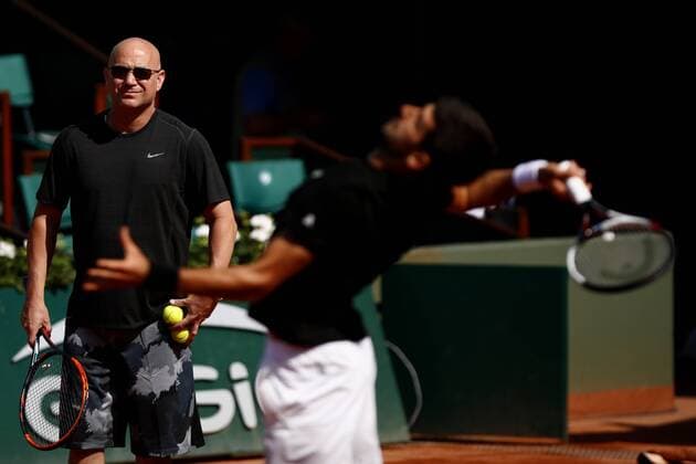 May 29, 2017 - Paris, France - Coach Andre Agassi looks on as Novak Djokovic of Serbia practices on day two of the 2017 French Open at Roland Garros on May 29, 2017 in Paris, France. 2017 French Open - Day Two  - ZUMAn230 20170529_zaa_n230_149 Copyright: xMehdixTaamallahx